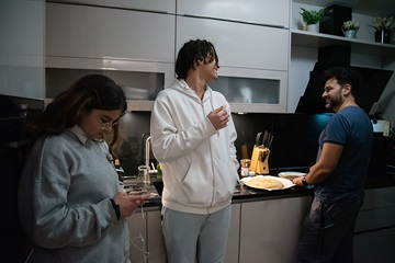 Family manager Rahman making dinner for his family