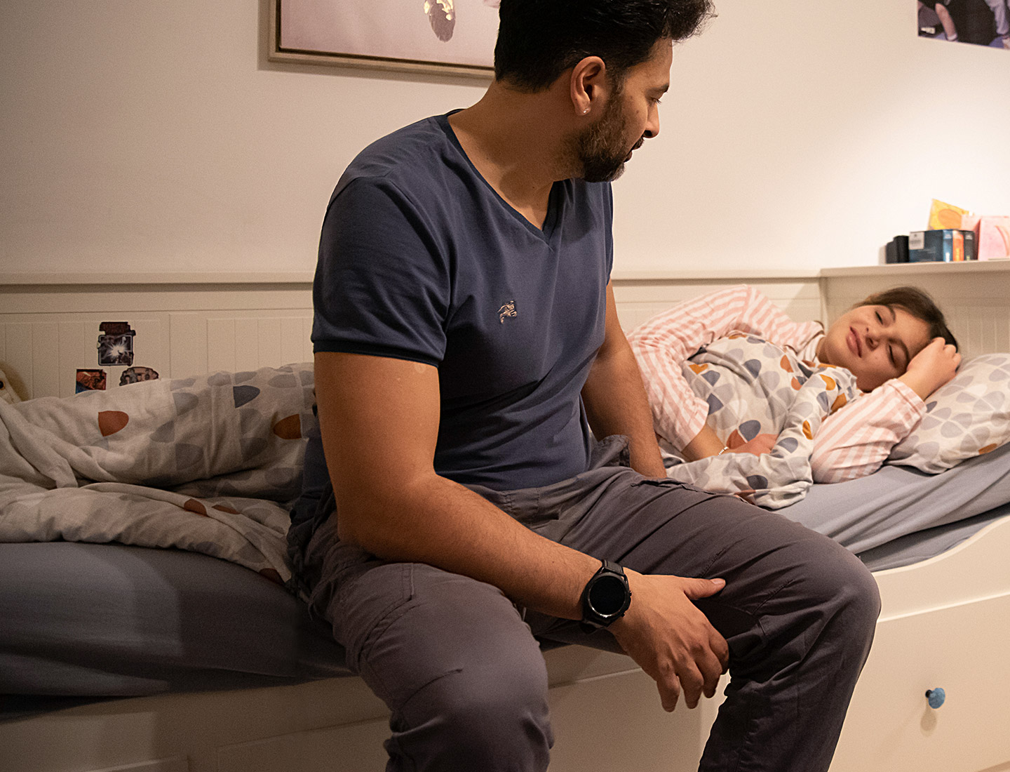 Family manager Rahman bringing his daughter to bed