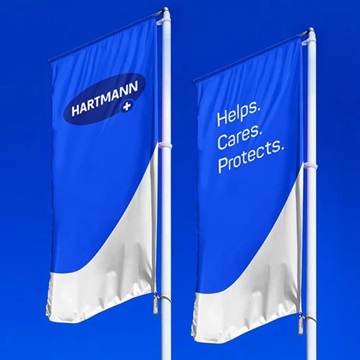 Corporate flags of HARTMANN with brand claim