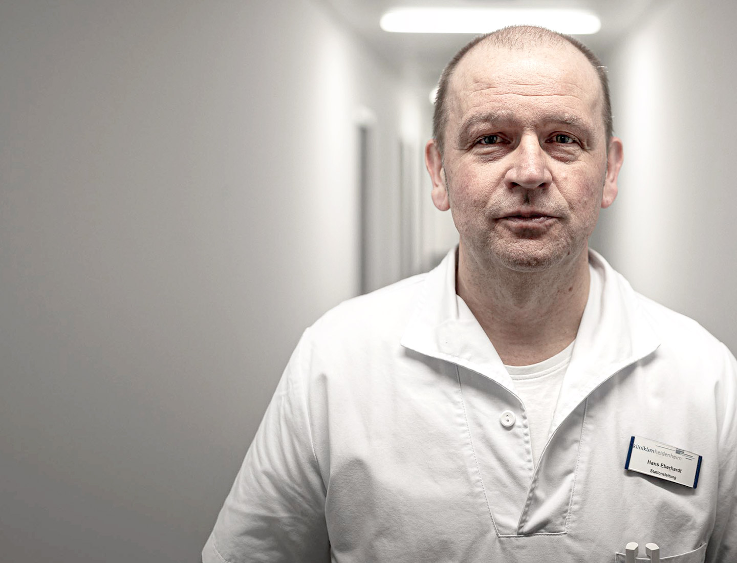 Hans Eberhardt, manager of infectiology ward at clinic Heidenheim, in hospital corridor